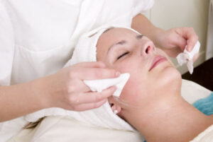 woman receiving a facial